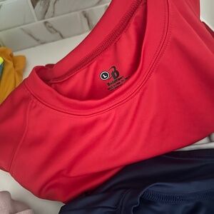 24 brand new t shirts, 1 sweatshirt brand new and two shorts brand new.